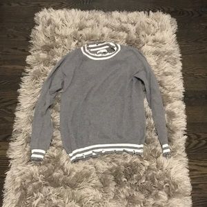 Distressed grey sweater with white stripes